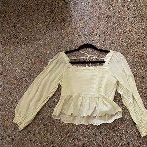 Light green bell sleeved crop top